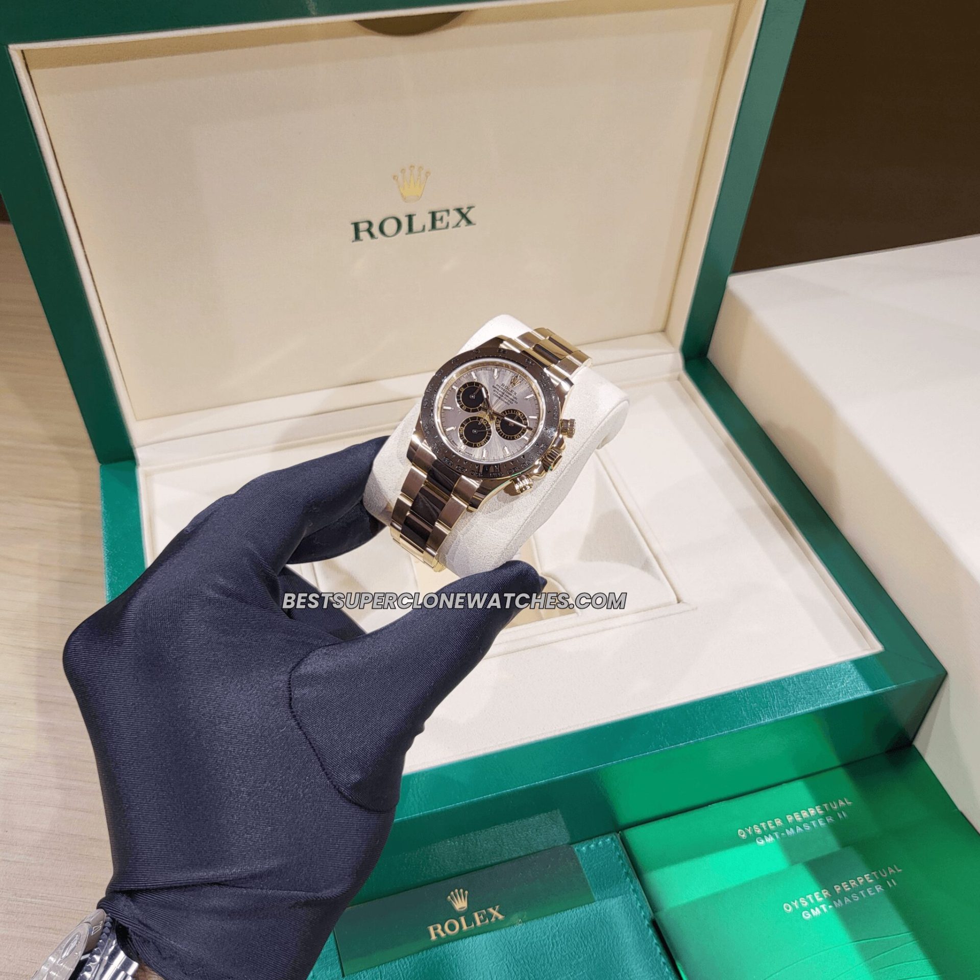 Rolex Daytona fake watch featuring sundust dial and polished Everose gold case
