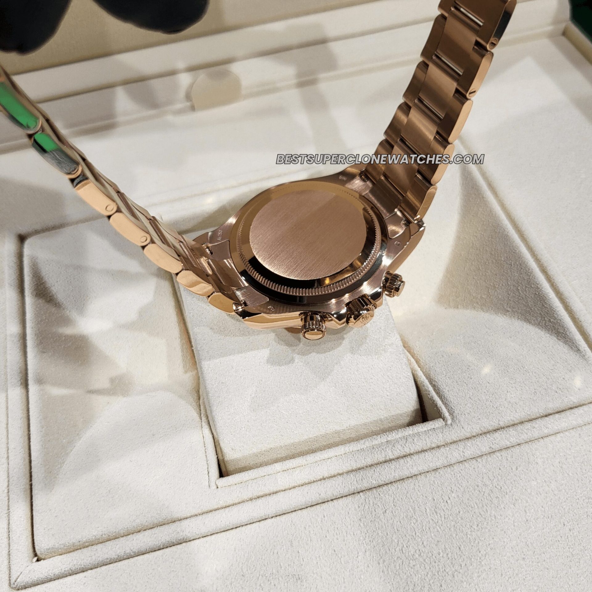 Detailed shot of Rolex Daytona super clone showing chronograph subdials on sundust dial