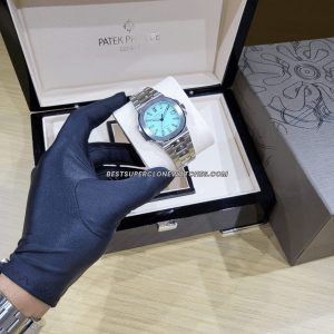 Dual view showing front dial and rear movement of the super clone watch