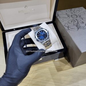 Super clone of Nautilus 5811/1G showing horizontal embossed blue dial and white gold tones