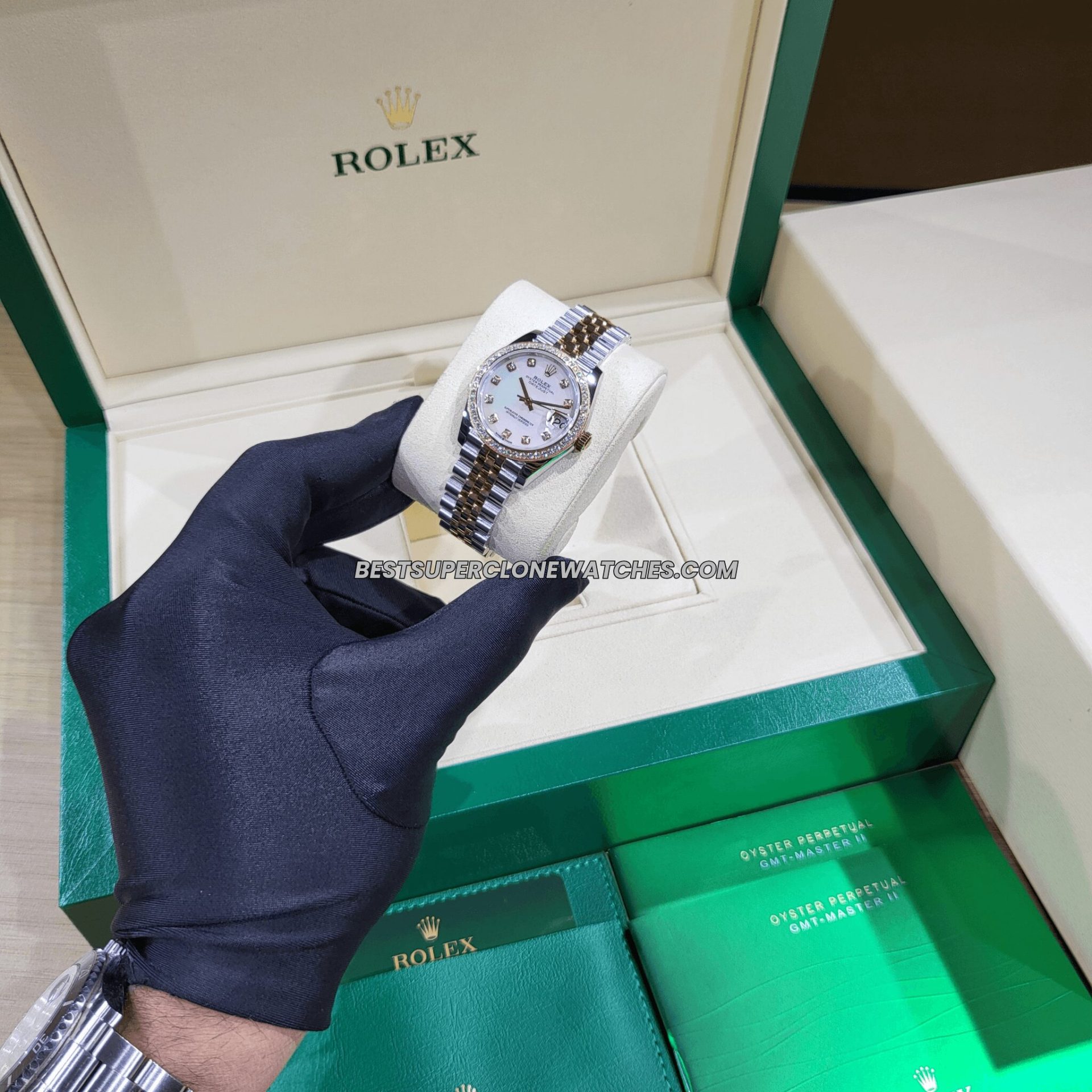 Replica Rolex Datejust 278381RBR, 31mm white mother-of-pearl dial, diamonds, and Everose Gold/Oystersteel case