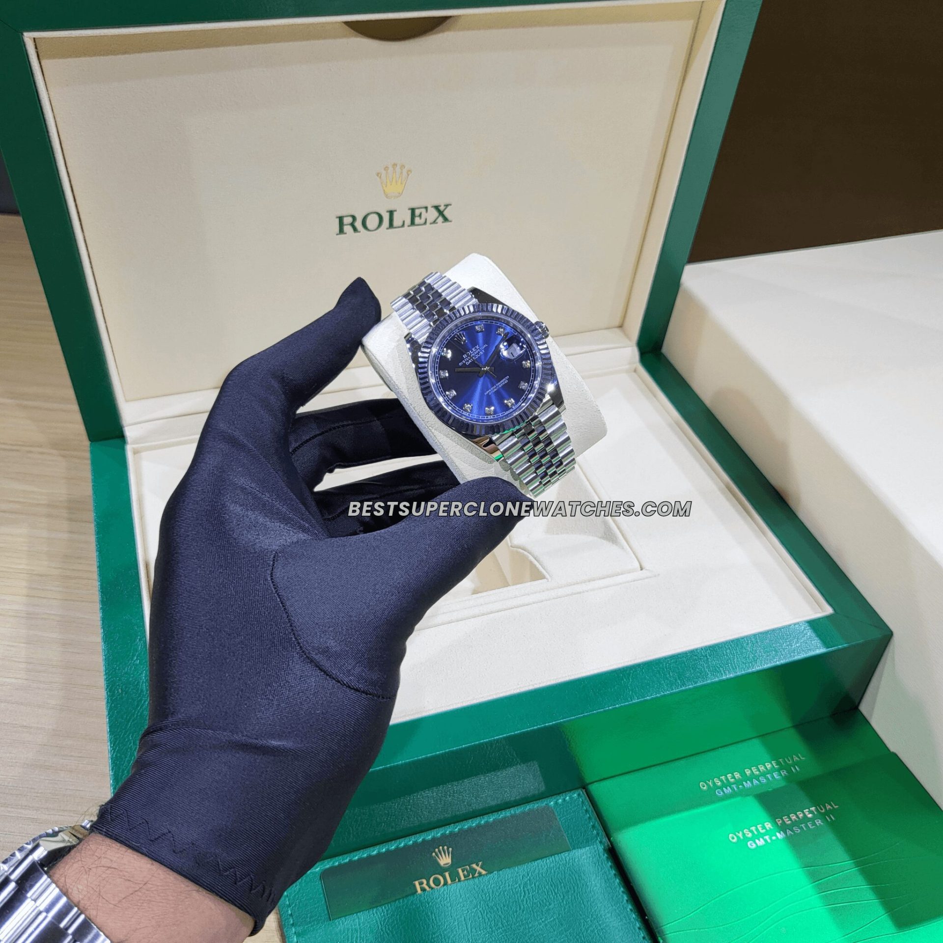 Fake Rolex Datejust 3235, a super clone with diamond-set bright blue dial, Oystersteel case, and white gold for a luxurious replica.