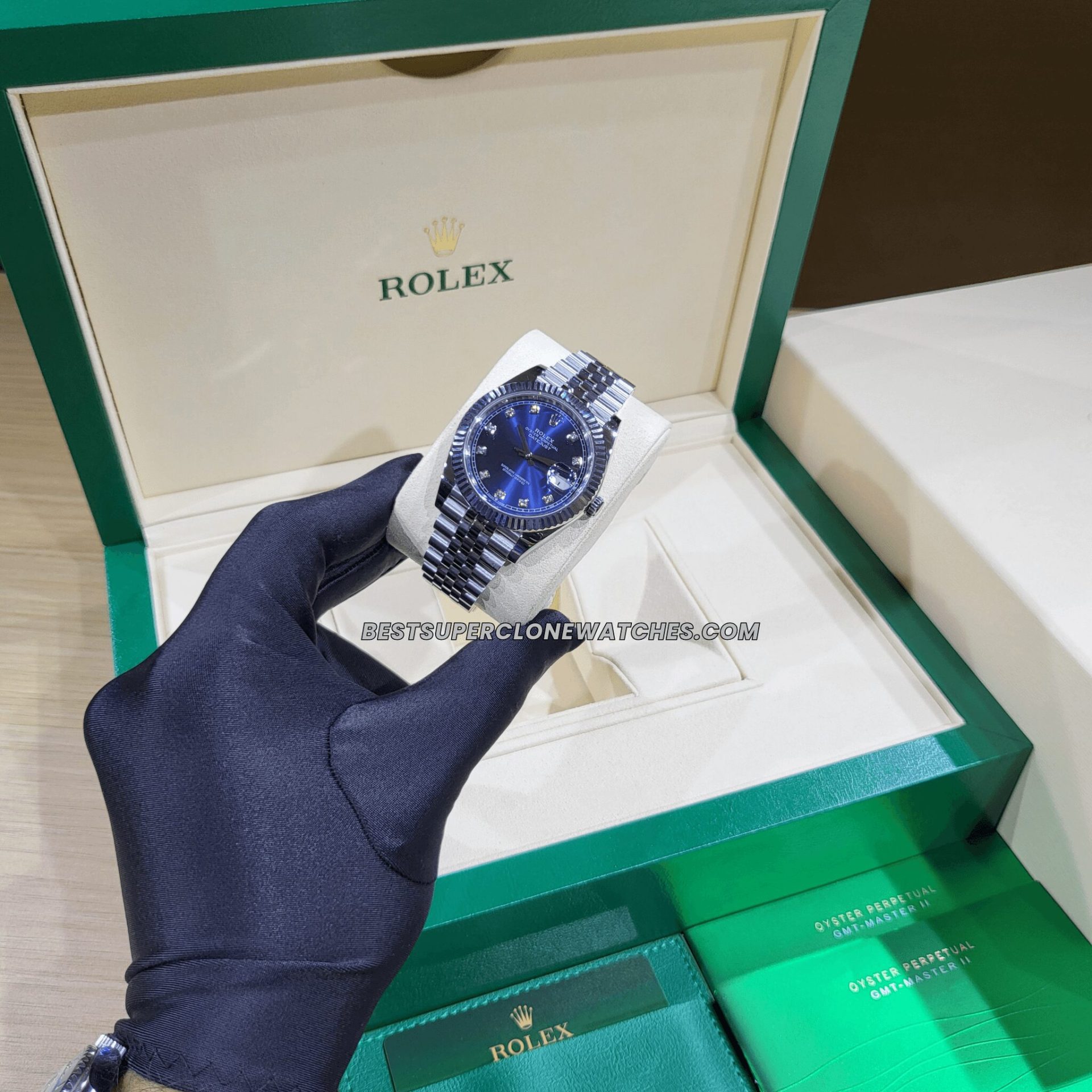 Swiss-made fake Rolex Datejust Ref-126334 with diamond-encrusted bright blue dial, Oystersteel case, and white gold bezel—super clone.