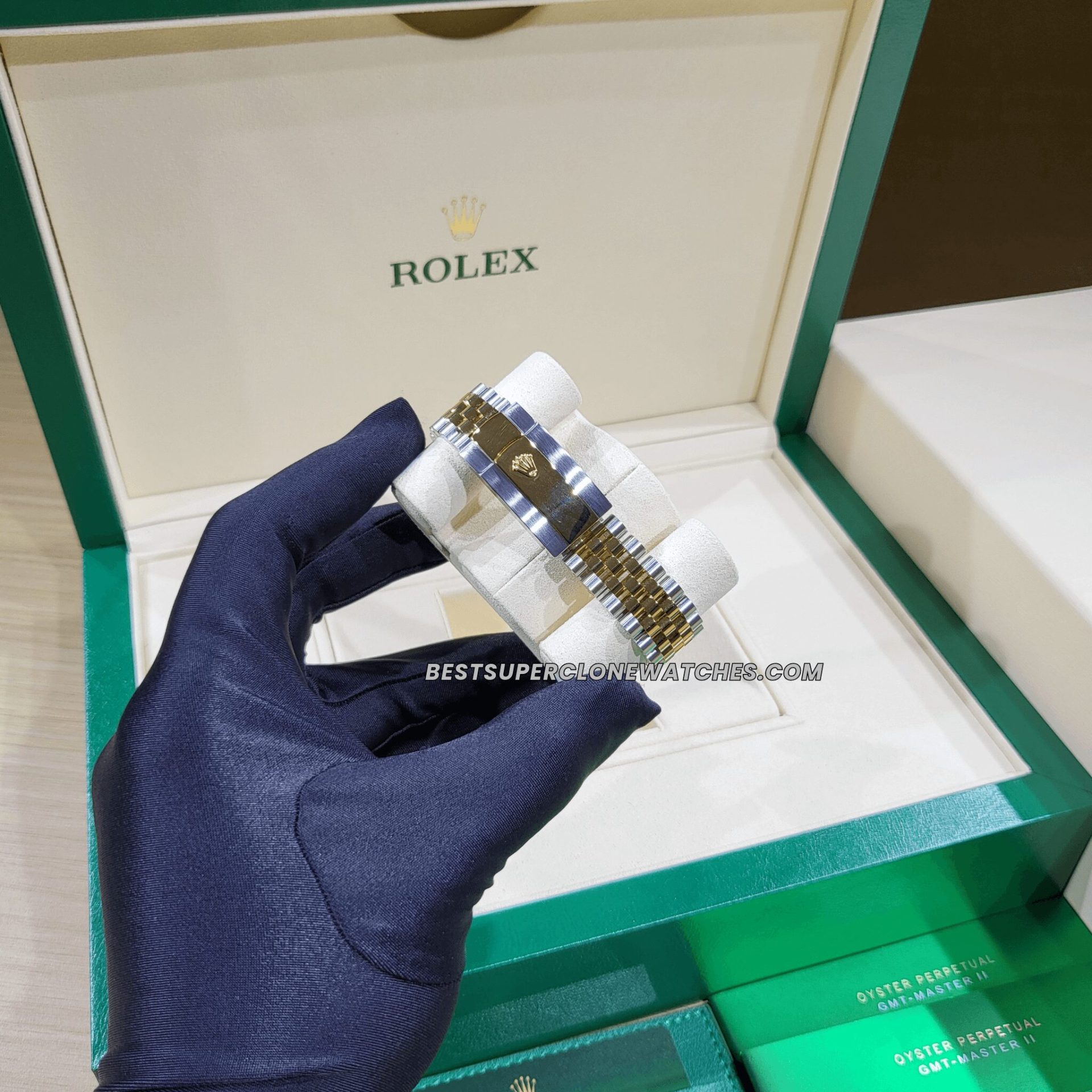 Close-up of the Rolex Datejust 3235 Swiss super clone, featuring a diamond-set champagne-colour dial with yellow gold and Oystersteel case.