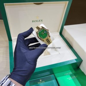 High-quality replica of Rolex Day-Date with bright green dial and yellow gold finish