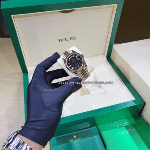 High-quality replica of Rolex Day-Date featuring rose gold case and diamonds on Eisenkiesel dial