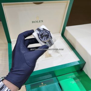 Rolex 228238 Swiss clone with iconic day-date display and bright green dial