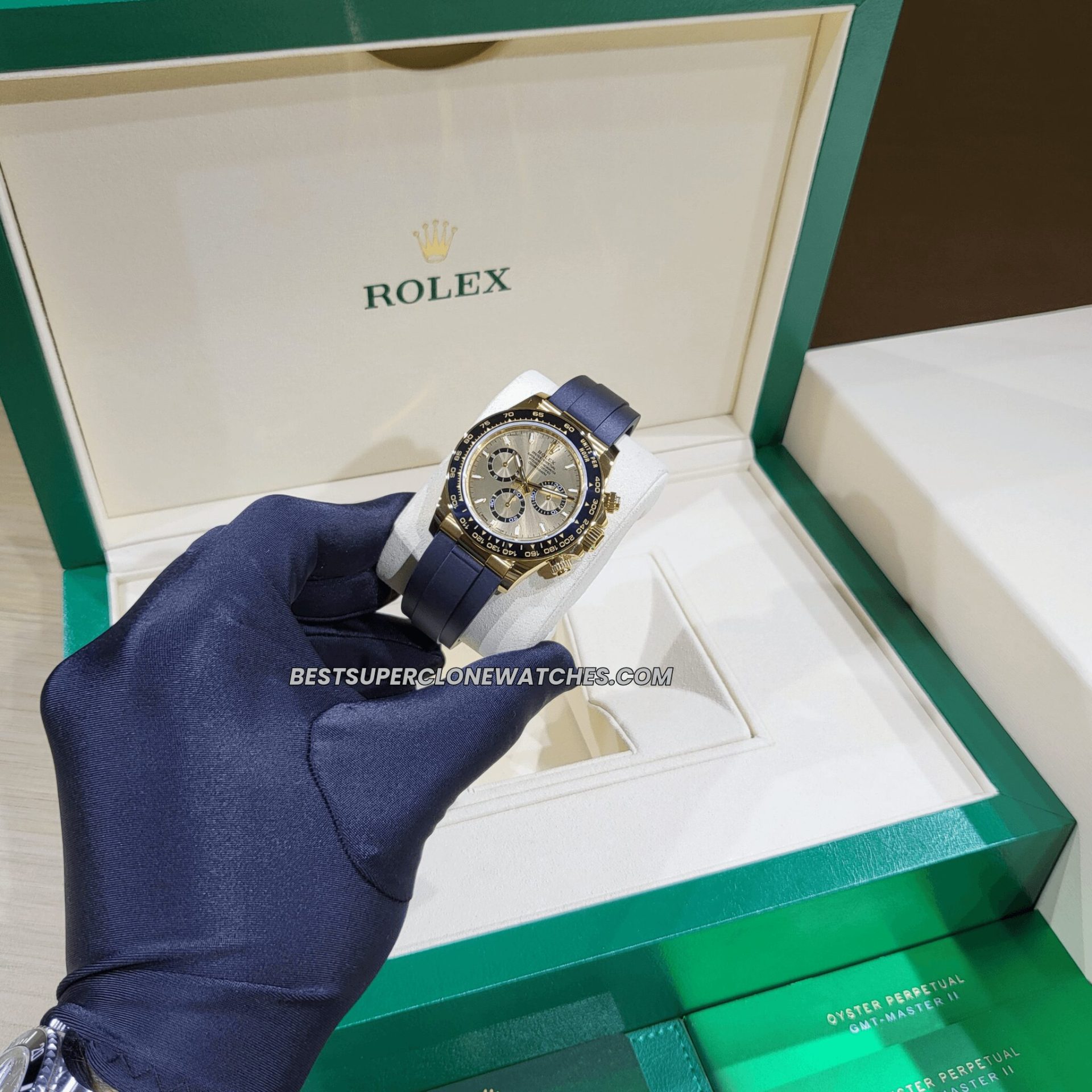 Close-up of Rolex Daytona super clone with golden dial and yellow gold case