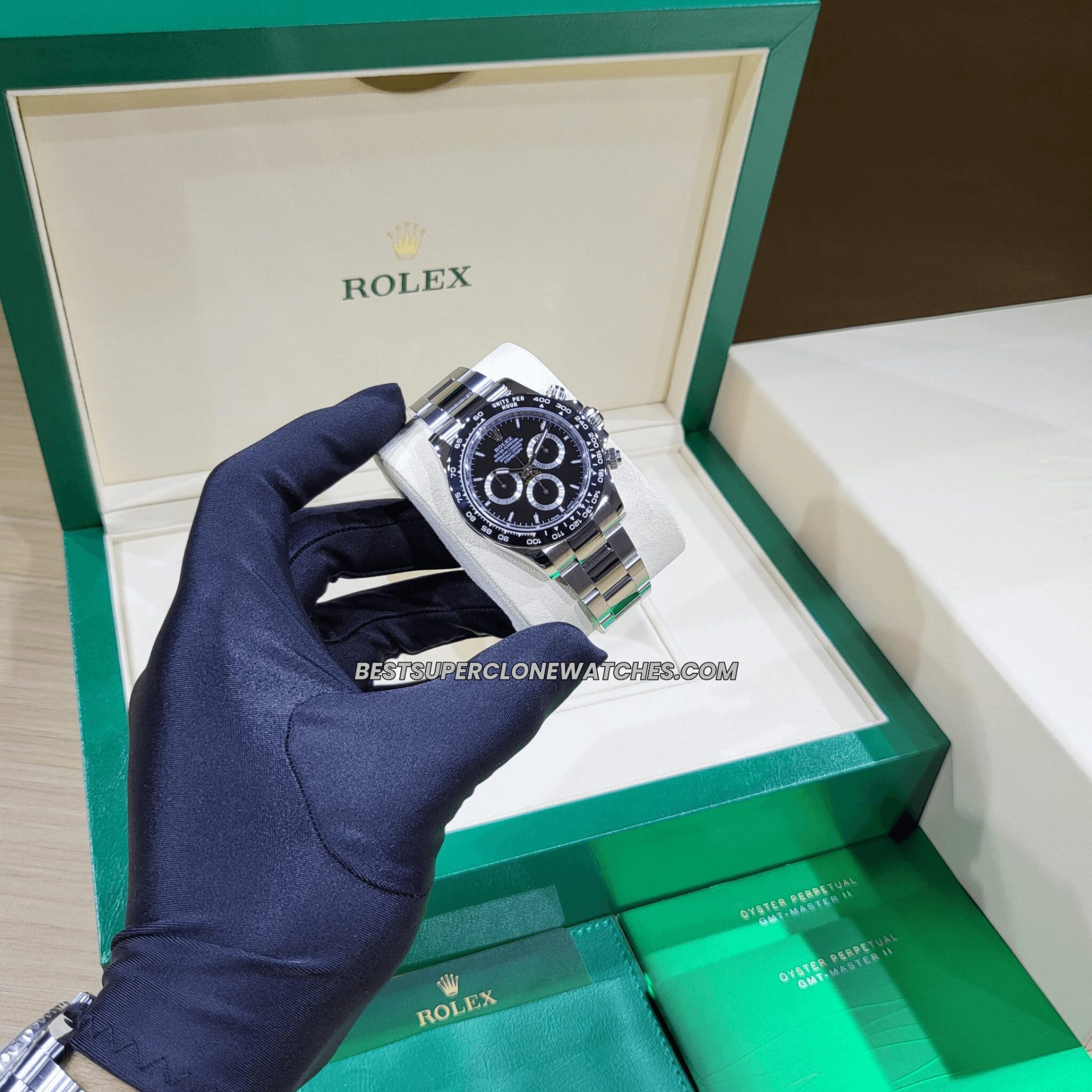 Replica Rolex Daytona with 4131 clone movement featuring panda-style black and white dial
