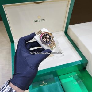 Luxury fake Rolex Daytona with diamond-set rainbow bezel and black dial on Everose gold case