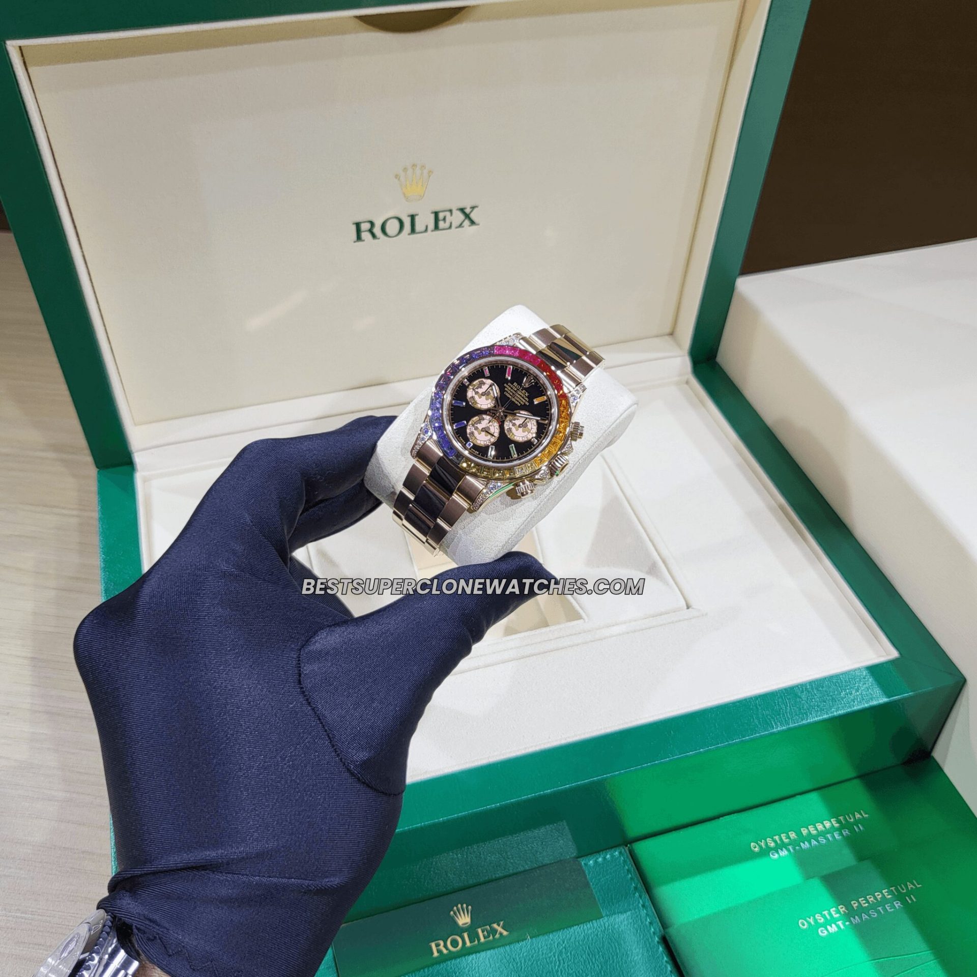 Replica Rolex Daytona with 4130 clone movement and colorful rainbow bezel on Everose gold case