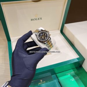 Replica Rolex Daytona featuring 4131 clone movement and two-tone yellow Rolesor with black dial