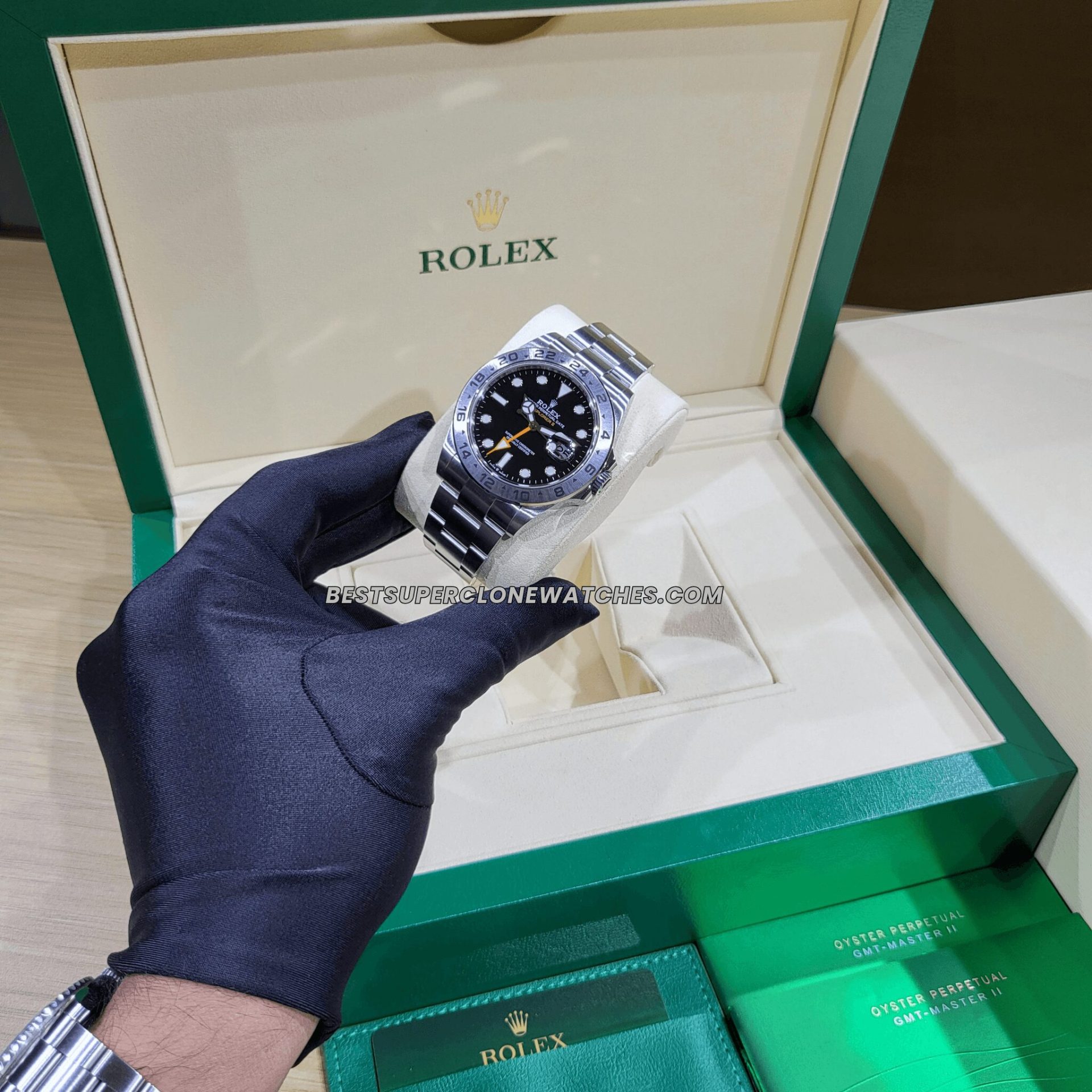 Swiss super clone Rolex Explorer II featuring black dial with luminous markers and 24-hour hand