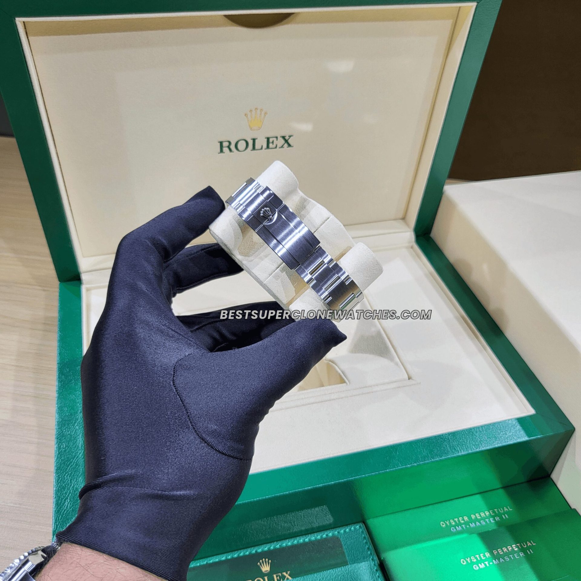 Fake Rolex Explorer II watch with Oystersteel case and iconic black dial