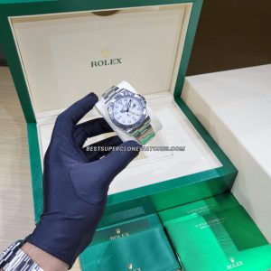 Detail shot of fake Rolex bracelet links with a clean brushed finish and smooth clasp