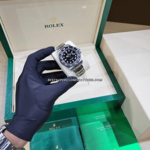 Close-up of Rolex GMT Master II super clone with black dial and oystersteel bracelet