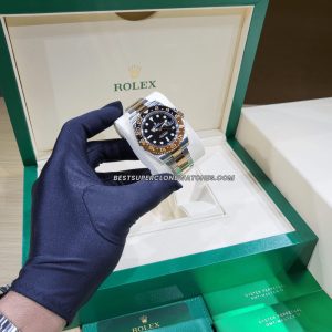 Close-up of Rolex GMT Master II super clone with black dial and cyclops date magnifier