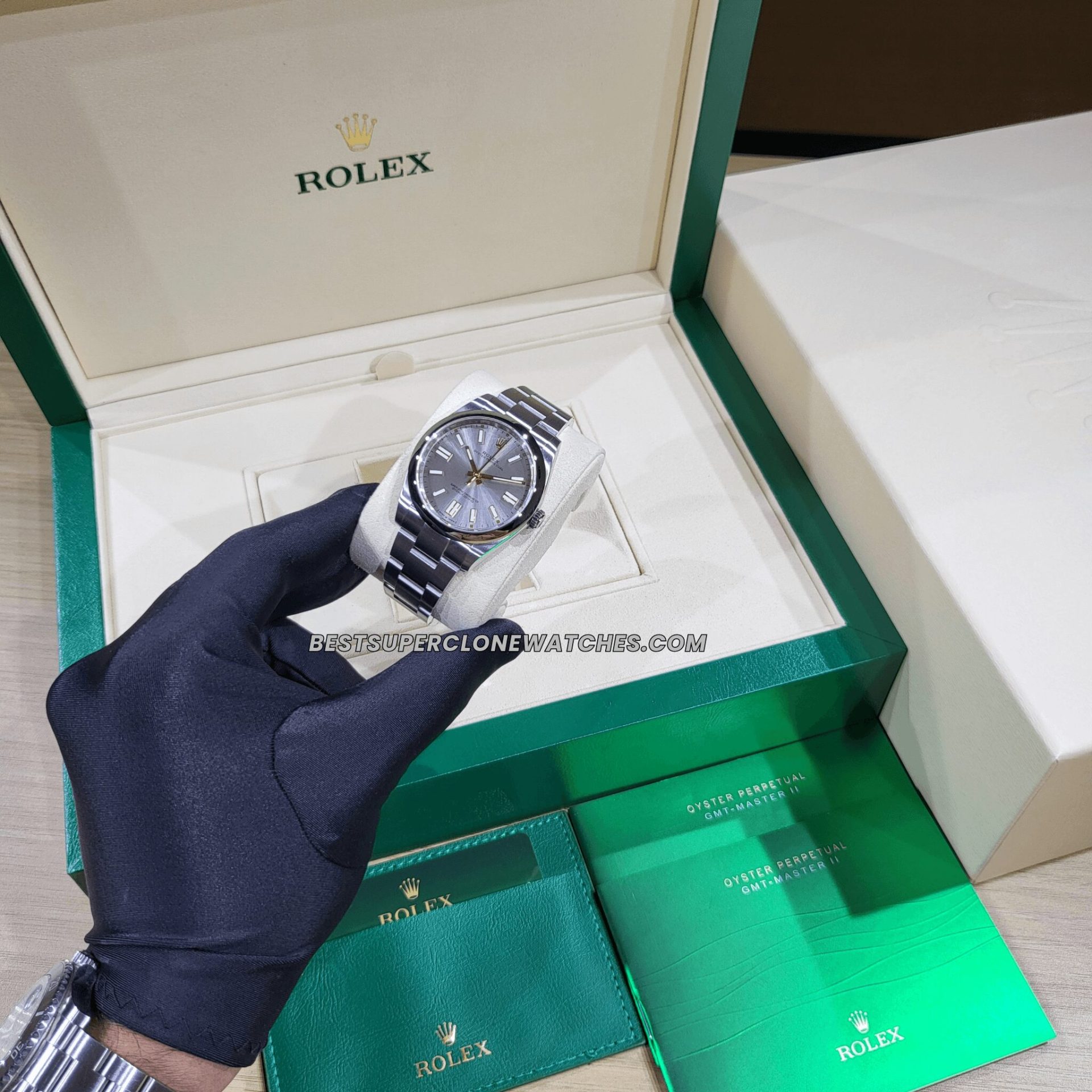 Super clone Rolex Oyster Perpetual 124300 featuring elegant silver dial and polished stainless steel case