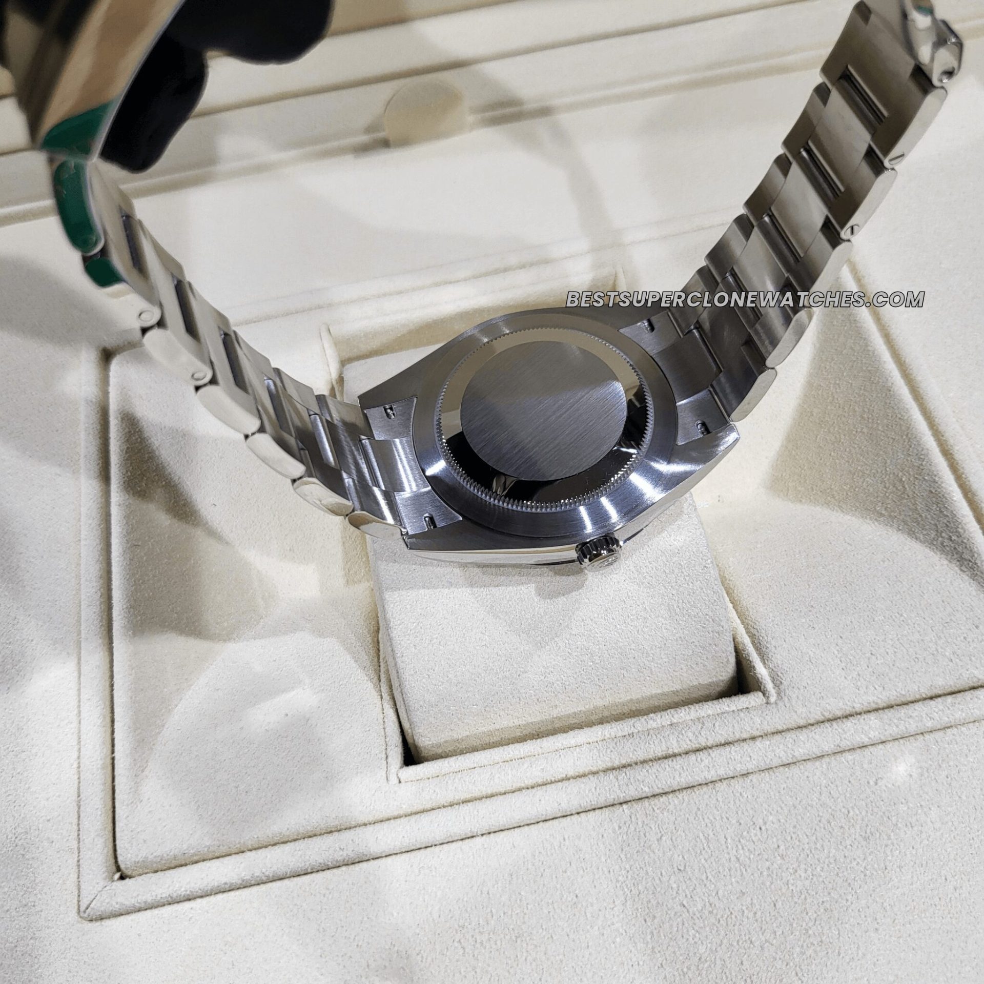 High-quality replica Rolex Oyster Perpetual featuring a refined silver dial and smooth stainless steel bracelet