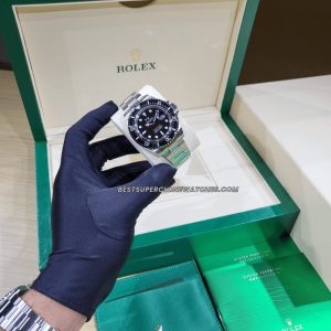 Side view of super clone Rolex Sea-Dweller with brushed Oystersteel case and sturdy bracelet links