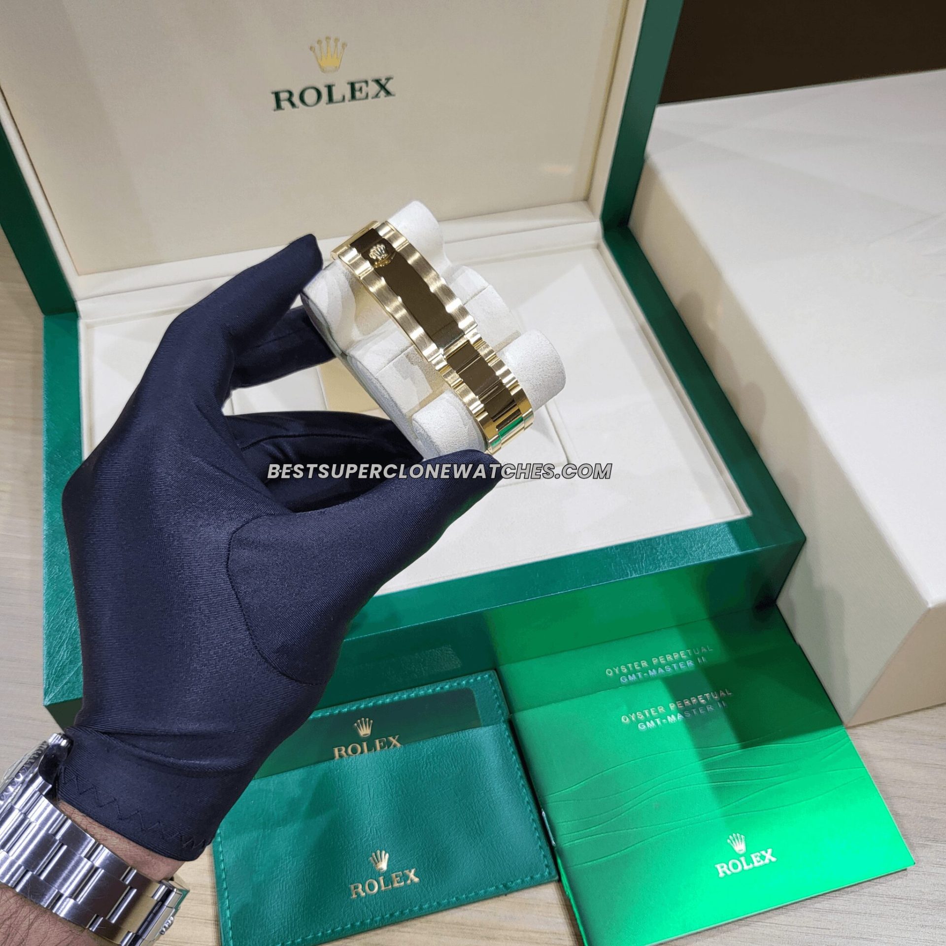 Swiss super clone Rolex Submariner black dial watch with gold oyster bracelet