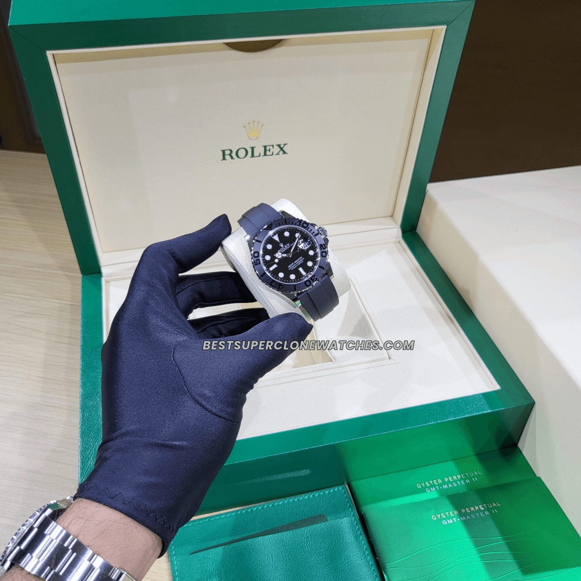 High-quality replica Rolex Yacht-Master featuring a sleek black dial, white gold case, and flexible Oysterflex strap