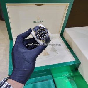 Fake Rolex Yacht-Master watch with yellow gold case, black dial, and Swiss 3235 movement imitation