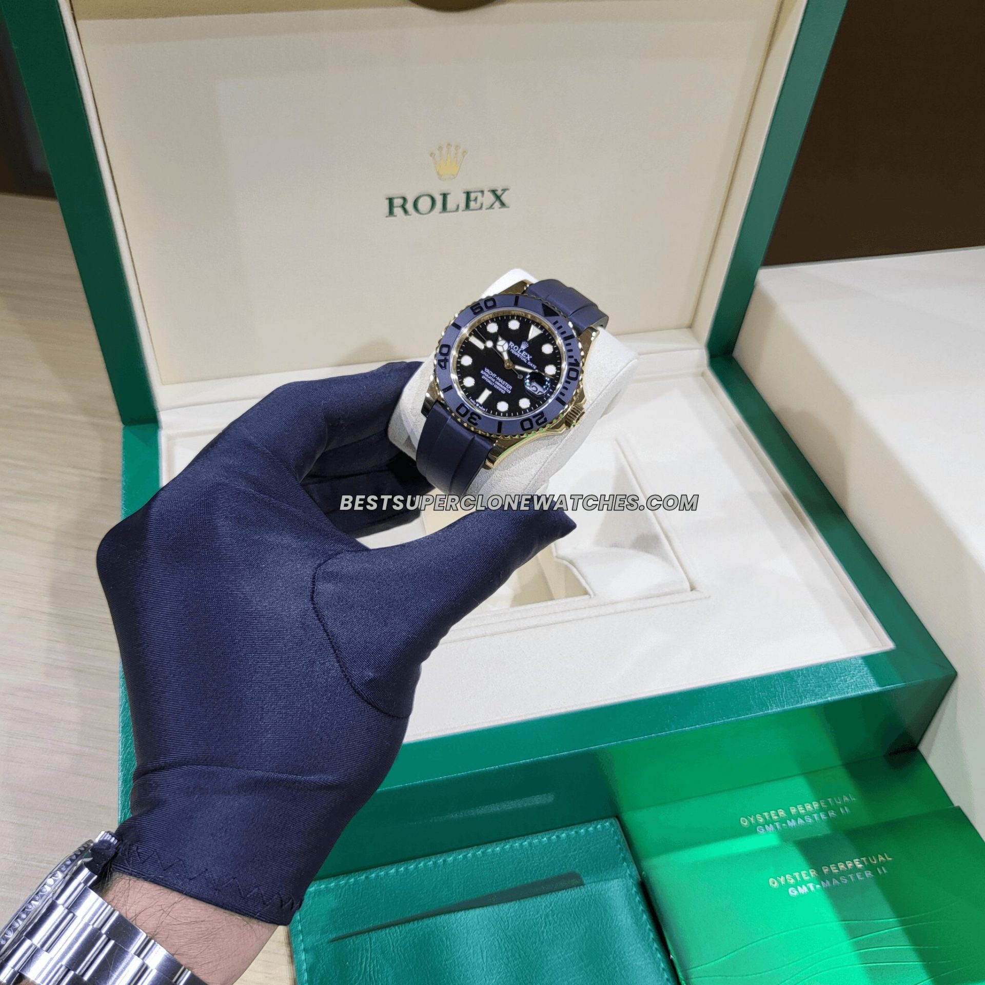 Super clone Rolex Yacht-Master 226658 with striking yellow gold bezel, black dial, and durable Oysterflex rubber strap